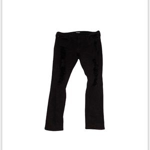 New without tags: Ripped style Express black mid-rise stretch skinny jeans